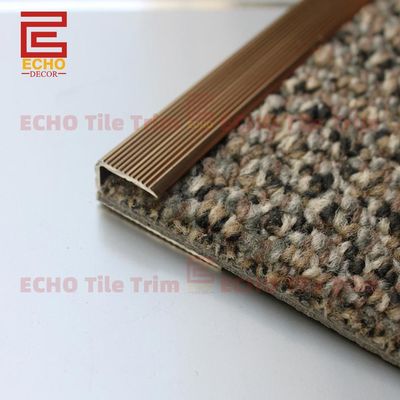 Thảm nhôm cắt trang trí cạnh cho thảm 3m trên bê tông